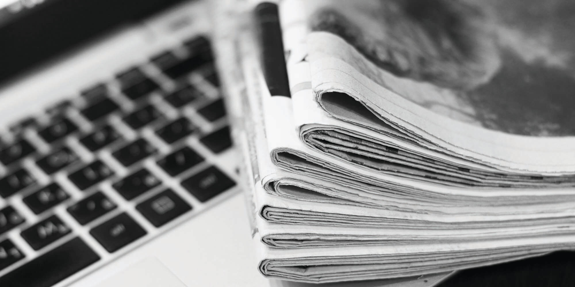 newspaper on a laptop