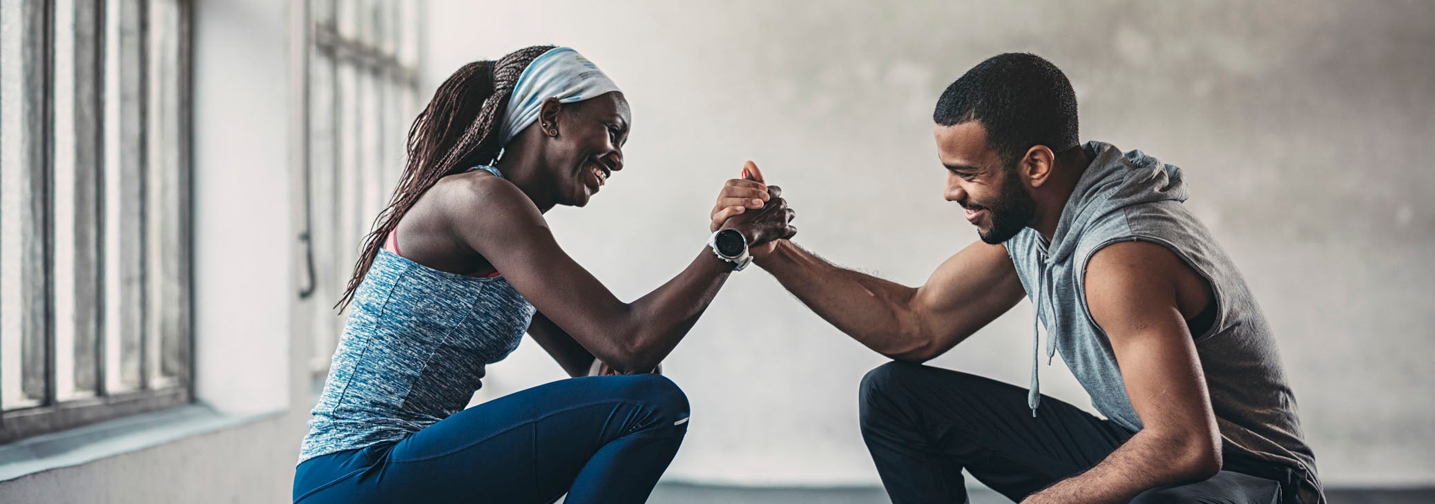 Two friends encouraging each other to live healthy lifestyles