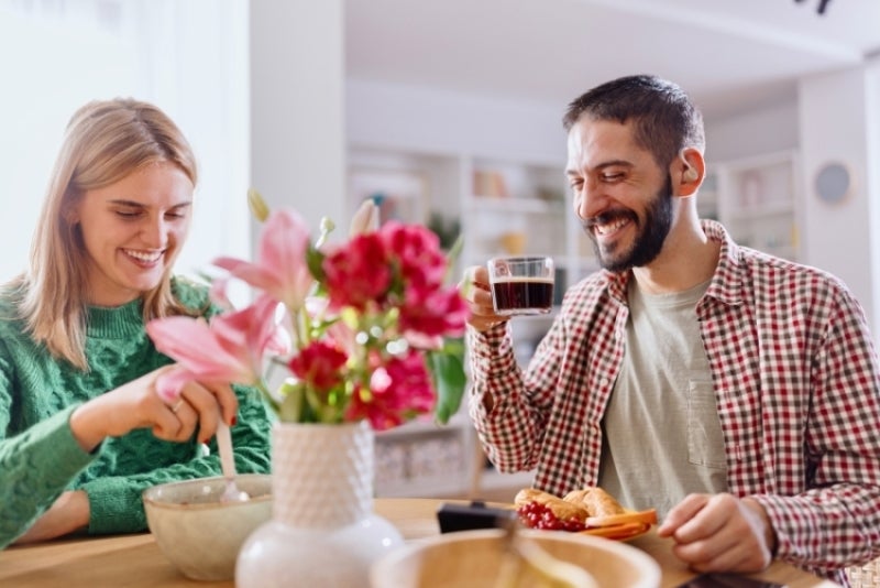 Man with cochlear implant enjoying breakfast