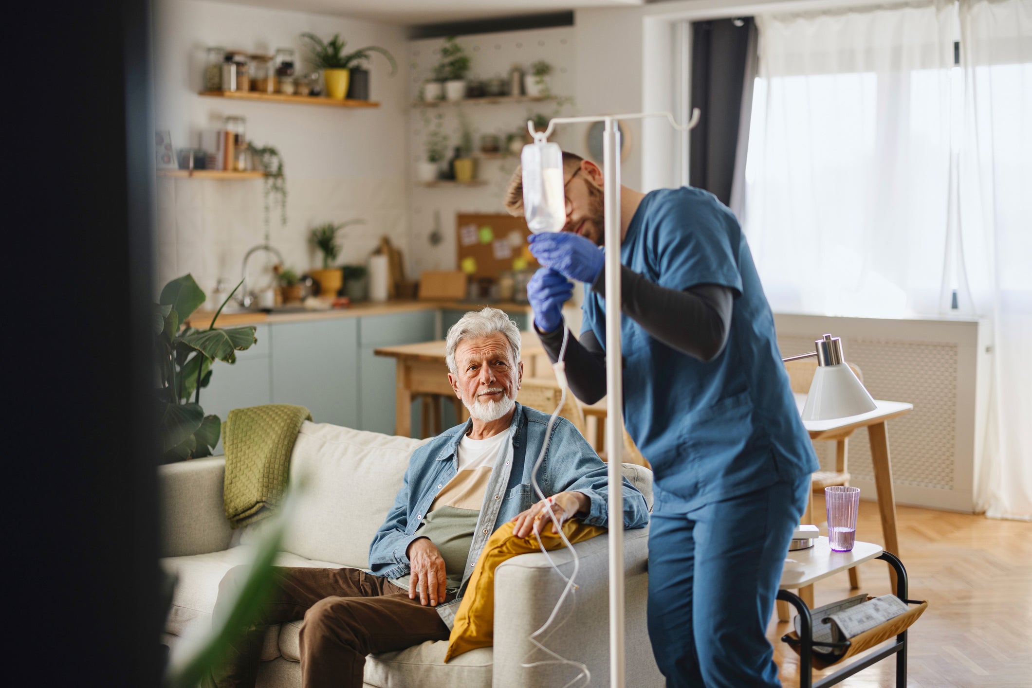 Patient receiving at-home infusion services