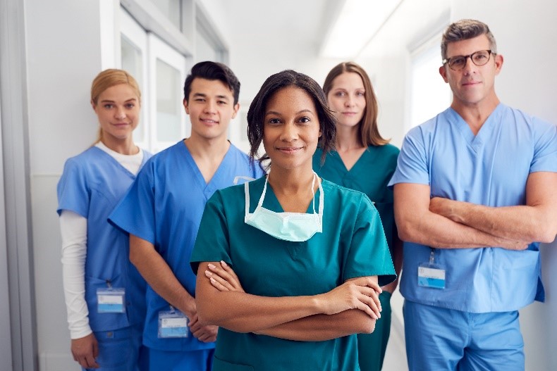 Proud doctors standing united