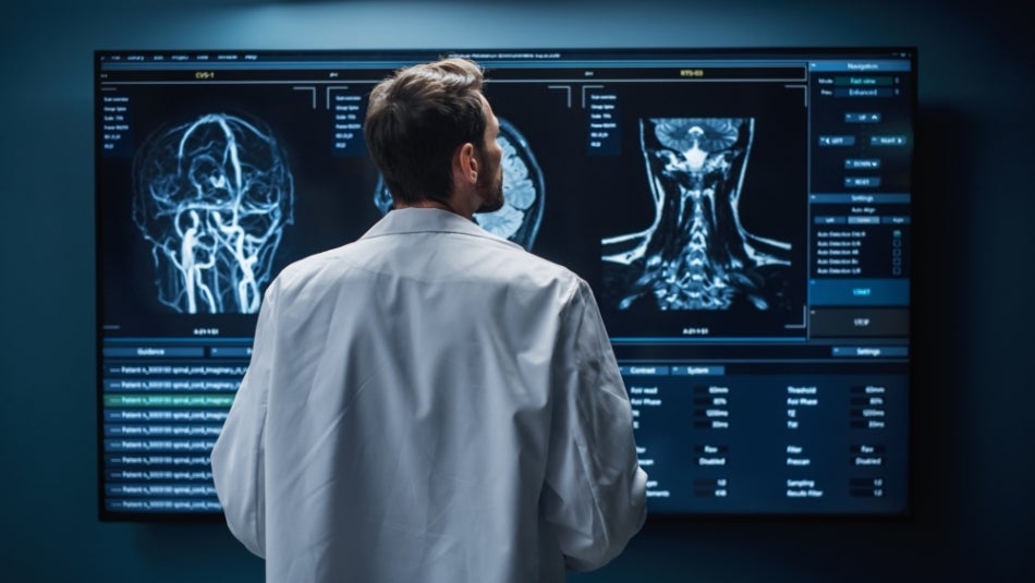 Doctor viewing x-rays