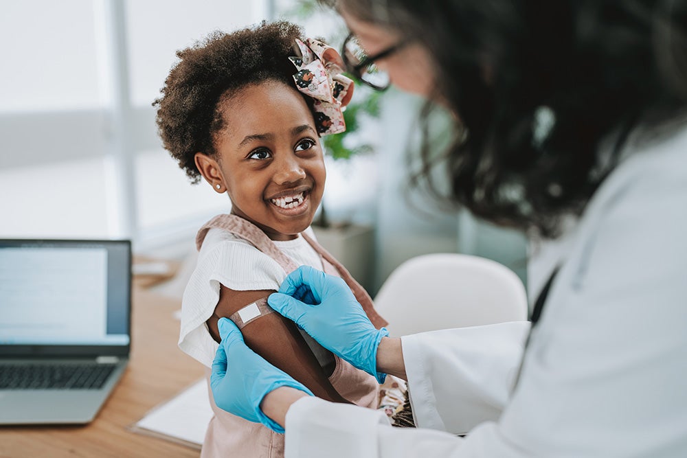 Child receiving an immunization shot