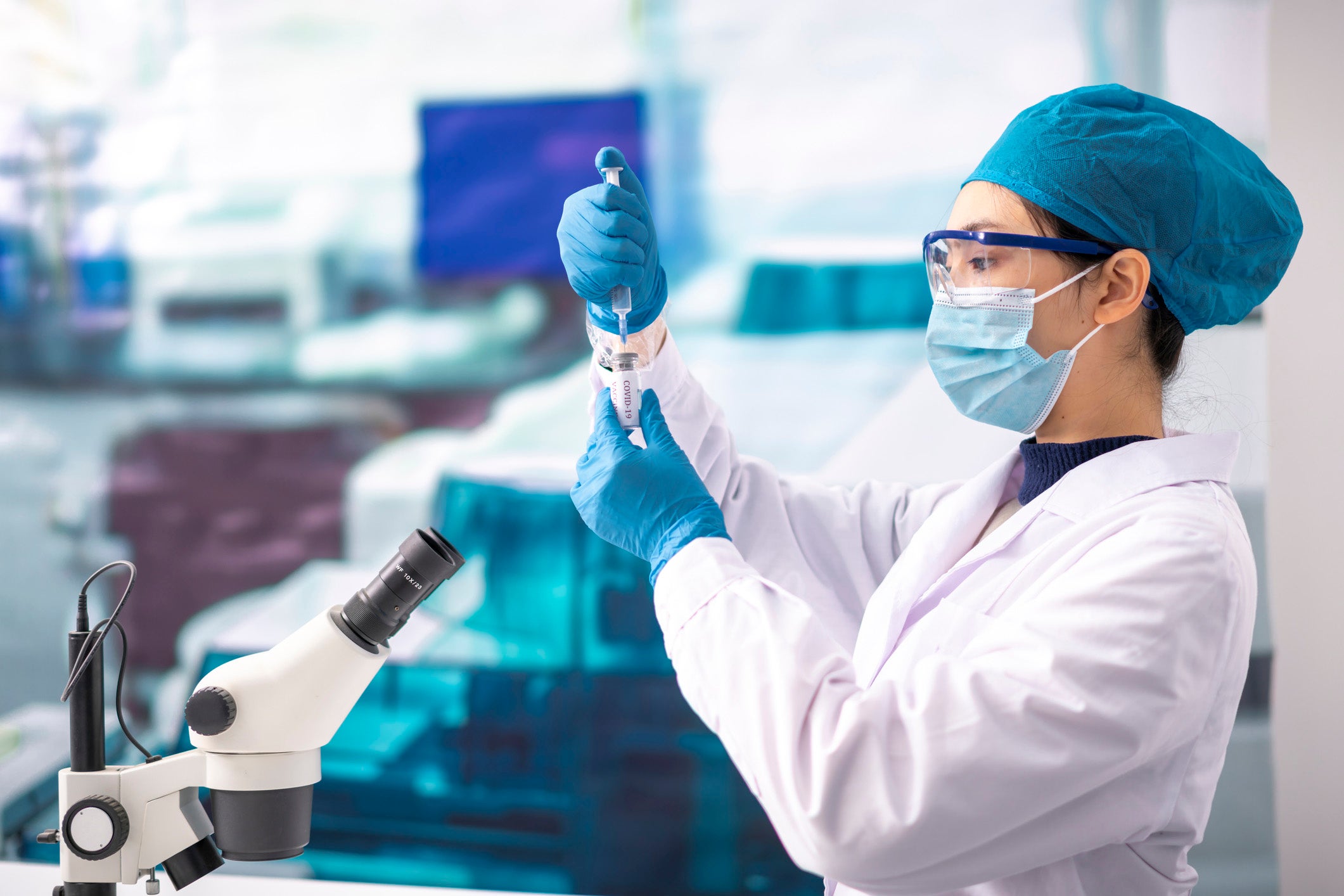 Infectious disease doctor administering COVID-19 vaccine